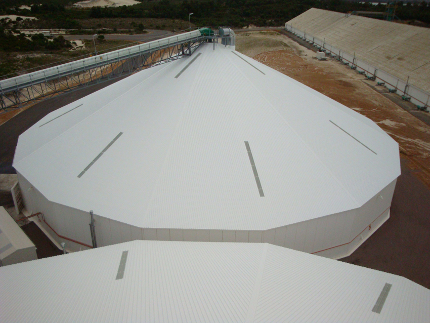 Step 8: Topcoat application of HRC over the entire roof surface to reduce internal temperature and pressure 
