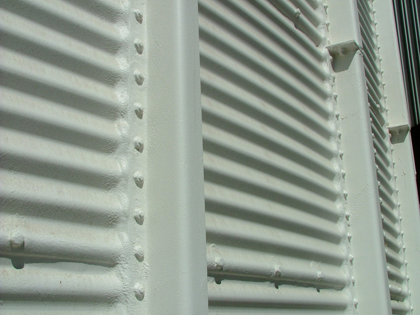 Step 9: Finished seamless Glo-Mastic seal over joints and bolts, with voids between wall cladding and extern