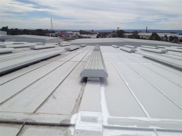 Step 5: New sealed section of the roof compared to an 18-year-old section.