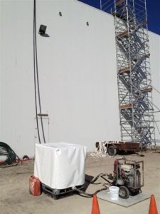 Step 7: Access and spray equipment set up to pump Novalast 151 LTM up and over onto the roof.